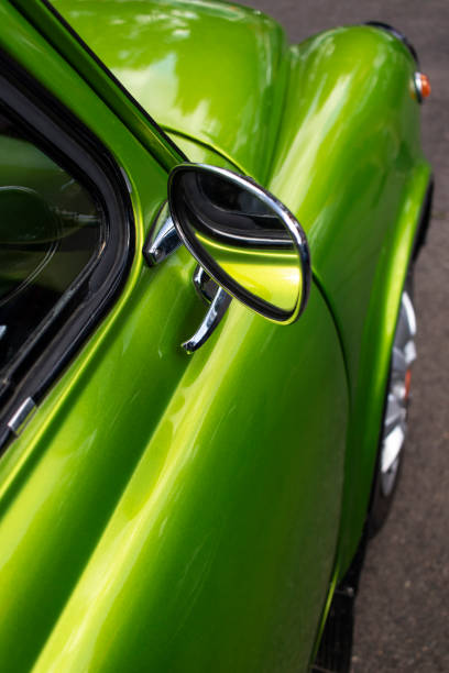 istock Rearview mirror on a green retro car. 1495916675