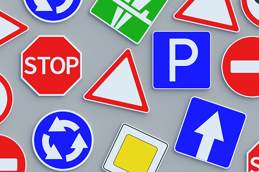 Many scattered road signs. Traffic laws. Driving school concept. Rules and regulation. Highway signpost. Roadway infrastructure. Top view. 3d render