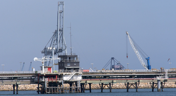 bridge with transport tubes and cranes