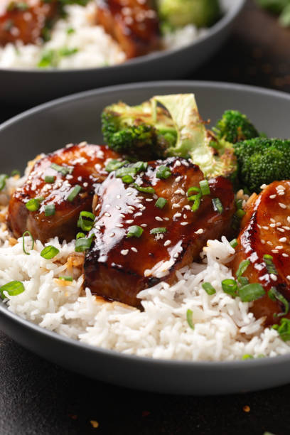 istock Teriyaki Pork Belly with broccoli, spring onion and rice 1495923138