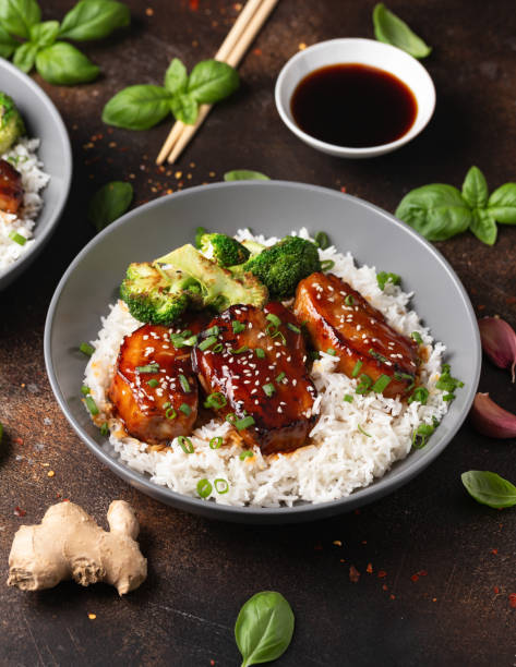 istock Teriyaki Pork Belly with broccoli, spring onion and rice 1495923142