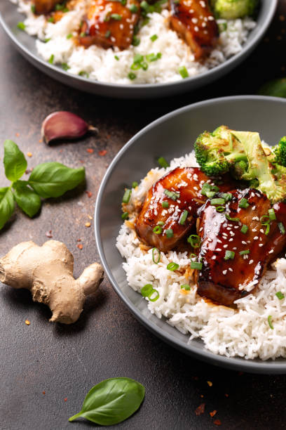 istock Teriyaki Pork Belly with broccoli, spring onion and rice 1495923143