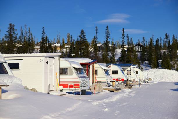 istock Snowy Winter camping with trailer 1495924902