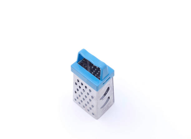 istock Mini stainless steel grater isolated on white background with copy space. 1495934835