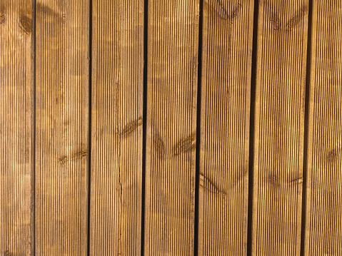 Siberian larch fluted wood terrace impregnated with oil before painting. Top view of decking of wooden planks