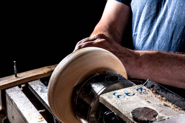 istock Creating a wooden bowl on the lathe. 1495934893