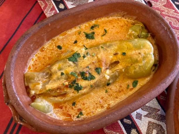 istock Kosovo - Speca me ajke ( Baked peppers in creamy cheese) 1495937548