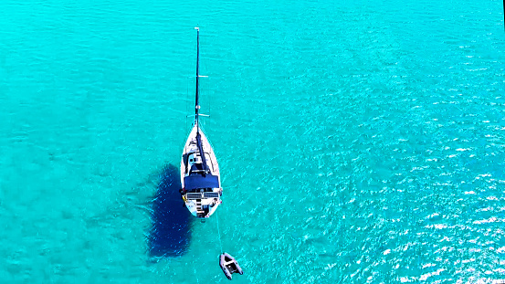 Beautiful aerial drone view of turquoise sea water up from the blue sky