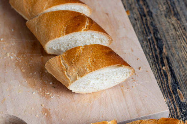 istock pieces of soft baguette on a cutting board 1495950613