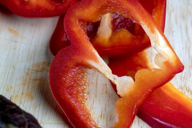 red sweet pepper on the kitchen board, cooking