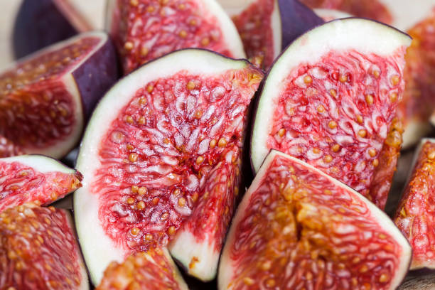 sliced ripe fresh purple figs, close up