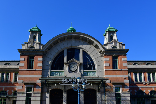 On a sunny day in May 2022, at Zou-no-hana Park in Yokohama, Kanagawa Prefecture, the Yokohama Customs, one of the three towers of Yokohama and the \