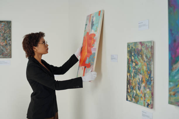 istock Gallery owner preparing for exhibition in gallery 1495954996