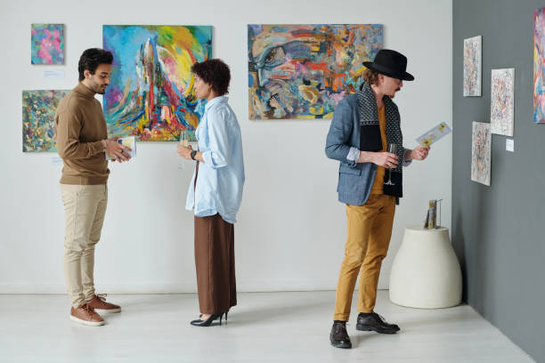 istock People visiting the exhibition of modern art 1495956079