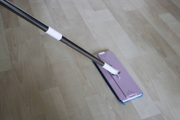 istock mop cleaning on floor at home 1495956135