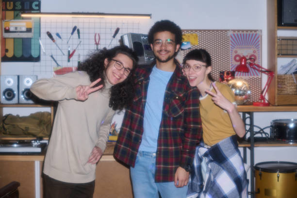 Teenagers of 90s posing at camera