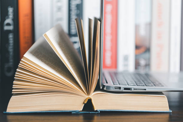 istock Book stack in the library room and blurred stack book for business and education background, back to school concept. Copy space for text. Distance education, e-learning concept. 1495965879