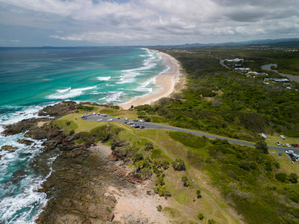 istock Aerial view of beach lookout over cliffs, blue ocean and white sandy beach 1495975367