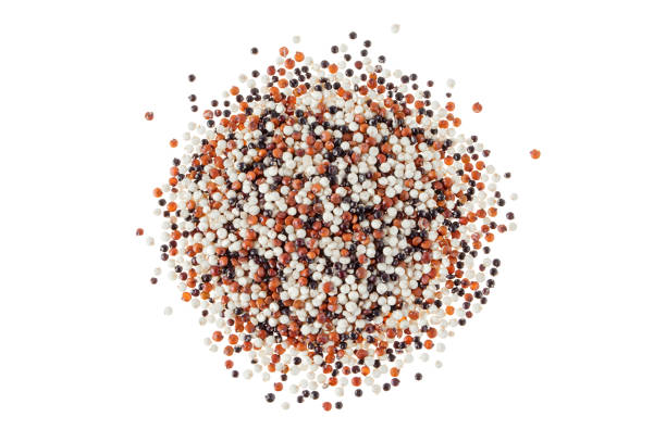 istock Quinoa seeds pile top view isolated on white 1495975397