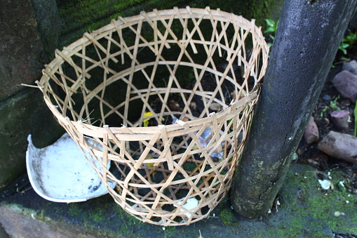 A basket made from woven bamboo skin