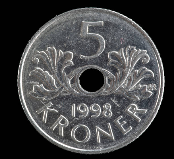 istock 1998 Norwegian 5 Kroner coin with a hole in the middle. 1495983358