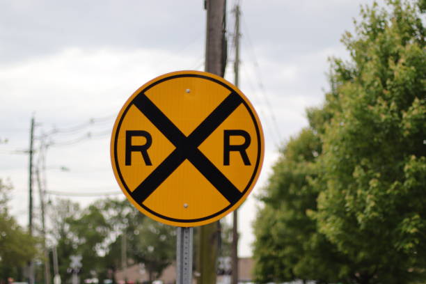 Railway crossing traffic signs. Portrait photo of signs