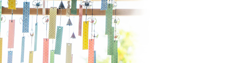 Japanese wind chimes. The small hanging bells made of metal or porcelain that rings in the wind.