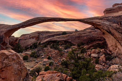 A view of Landscape Arch in Arches National Park at Sunset