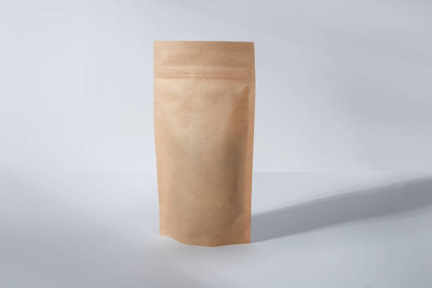 istock Craft paper pouch bag front and back view isolated on white background. 1495994782