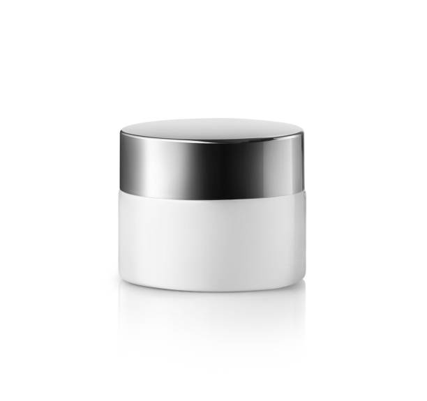 istock Round white matte plastic jar with silver lid for cosmetics - body cream, butter, scrub, bath salt, gel, skin care, powder. 1495995740