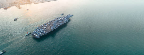 istock Nuclear War Ship, Military navy ship carrier full loading fighter jet aircraft for prepare troops. forwarder mast. Side view of War Ship. 1495996885