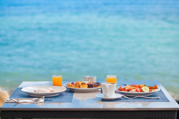 istock Delicious breakfast on coast, surrounded by the stunning views 1495998334