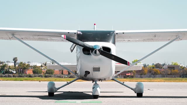 The propeller stops spinning while the airplane parks