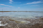 salt lake Baskunchak in the Astrakhan region in Russia. The largest salt Deposit.The salt trail is washed by a salt lake.