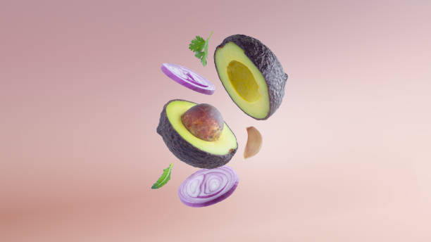 Floating ripe avocado whit a sliced purple onion,garlic clove and cilantro levitating on pink background Floating ripe avocado whit a sliced purple onion,garlic clove and cilantro levitating on pink background hass avocado stock pictures, royalty-free photos & images