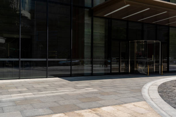 istock empty ground floor outside of  modern office building  exterior. 1496005505
