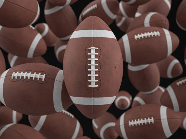 istock American football balls background 1496012455