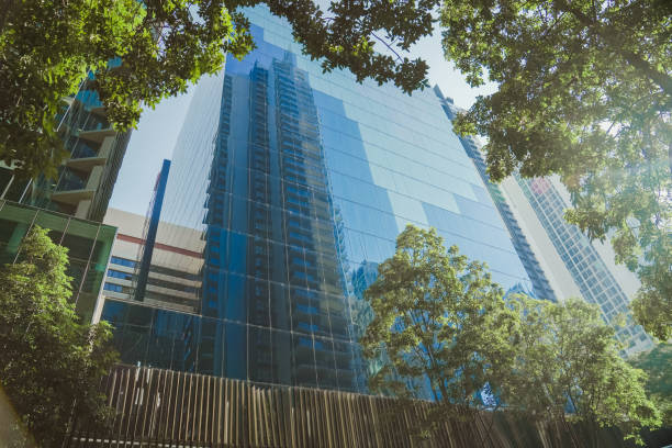 istock Corporate modern offices building among green trees in Brisbane CBD 1496018347