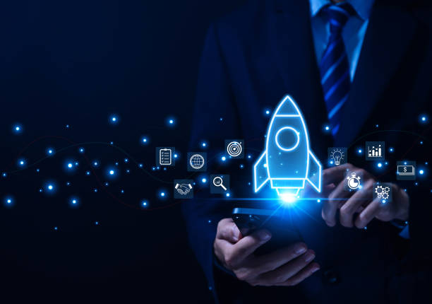 istock Smartphone showing a rocket Startup business concept 1496019391