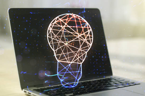 istock Double exposure of creative light bulb hologram on laptop background, research and development concept 1496019844