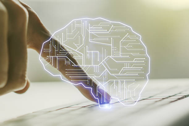 istock Creative artificial Intelligence concept with human brain hologram and hands typing on laptop on background. Multiexposure 1496020571