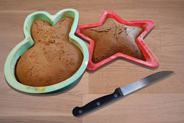 istock Baked chocolate brownie cake in a cake tin on a kitchen worktop 1496021193