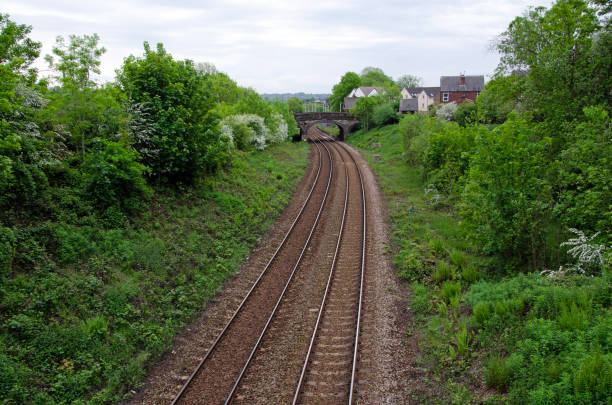 istock Rural train track curving into distance, UK 1496029528