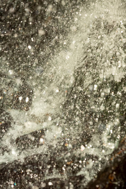 istock Stop action flash of a waterfall reveals the individual droplets. 1496034451