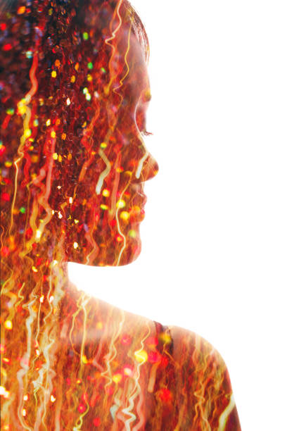 Inner energy. Art portrait. Dream imagination. Double exposure orange red color glitter firework bokeh sparks confetti relaxed woman face silhouette on white copy space.