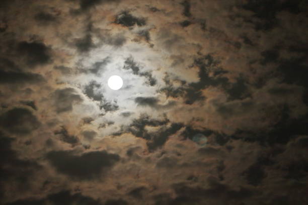 istock Full moon with clouds in the night sky. Beautiful Night View. 1496040998