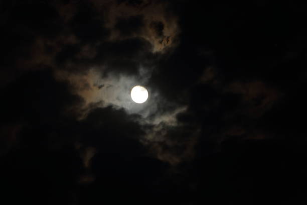 istock Full moon with clouds in the night sky. Beautiful Night View. 1496041033