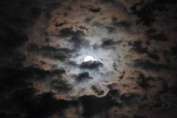 istock Full moon with clouds in the night sky. Beautiful Night View. 1496041113