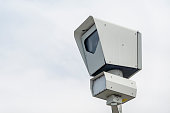 A close up to a speed traffic police camera. Automated photo enforcement used on multi-lane highways.