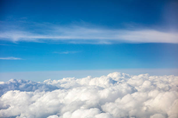 istock Cloud and blue sky from the airplane windows 1496043857